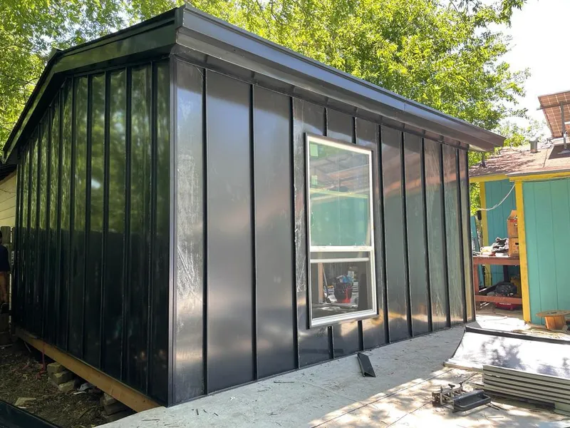 Black standing seam metal wall panels for Roof Inspection in Uxbridge